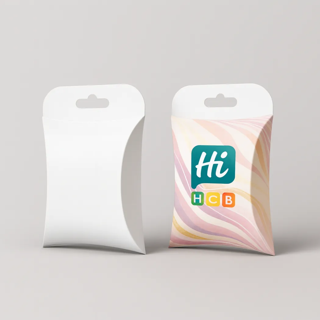 Small pillow boxes with hang tabs- featuring one plain white and one with orange waves- class=